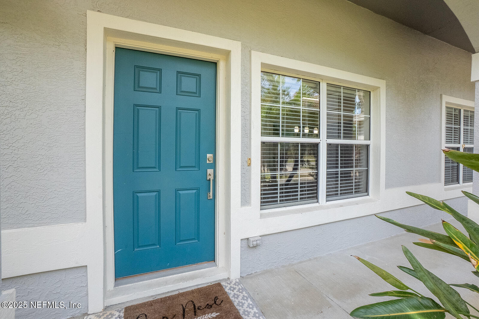 29 Edith Pope Drive Palm Coast, FL 32164 - Photo 6 of 26 a view of front door of house
