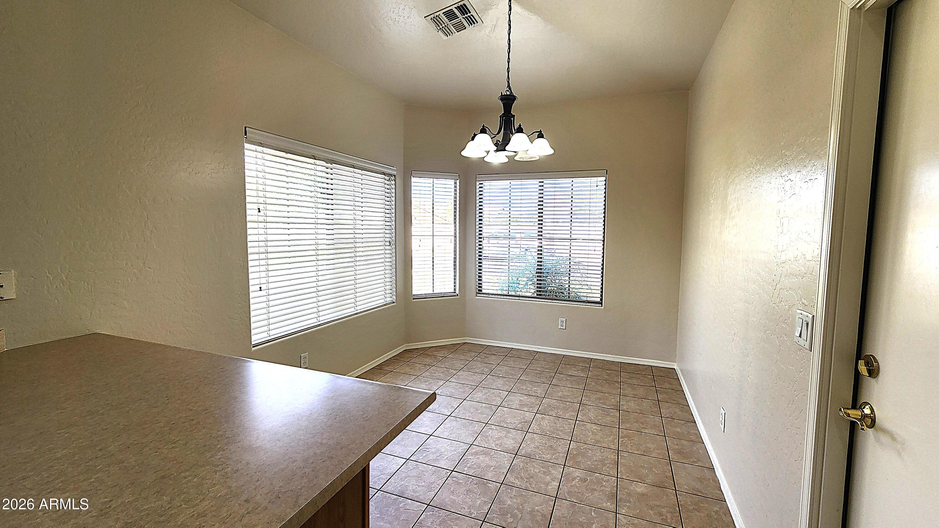 3566 South Seton Avenue Gilbert, AZ 85297 - Photo 7 of 41 20260624_164454