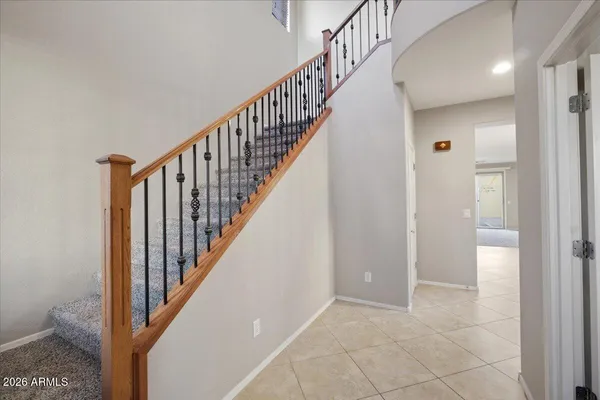 a view of staircase with wooden floor and staircase