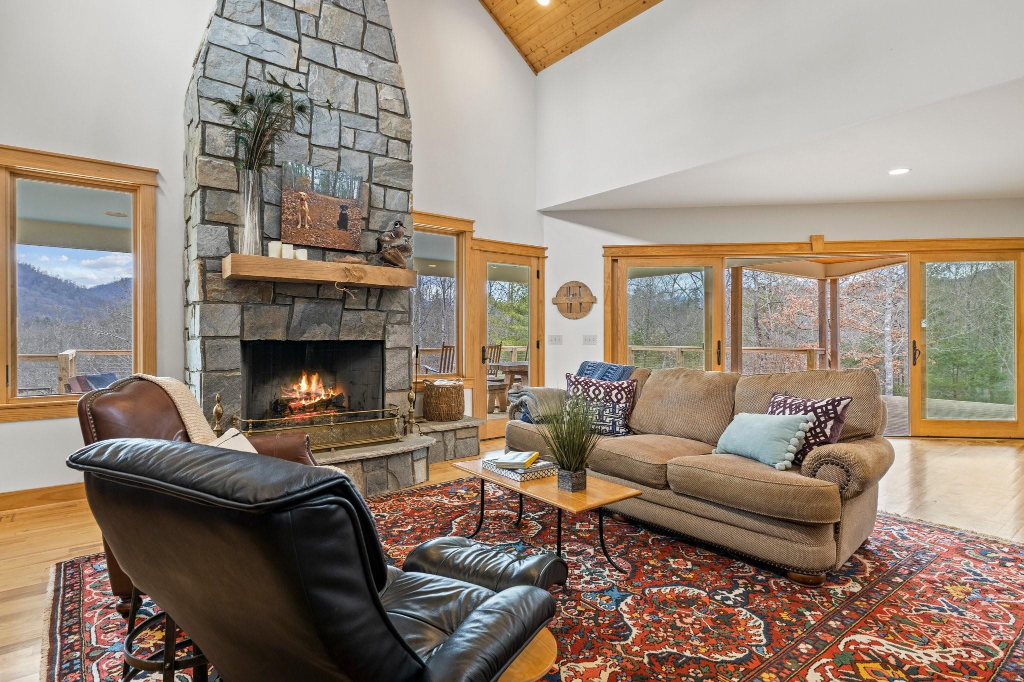 41 Rowan Hl Road Leicester, NC 28748 - Photo 12 of 48 a living room with furniture and a fireplace