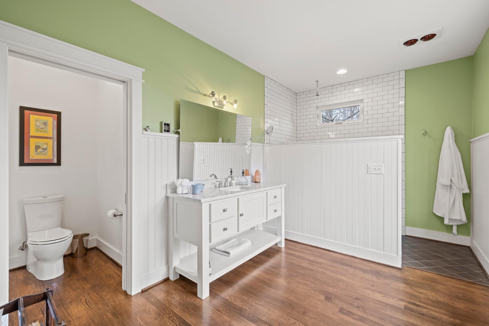 41 Rowan Hl Road Leicester, NC 28748 - Photo 24 of 48 a spacious bathroom with a double vanity sink and a mirror