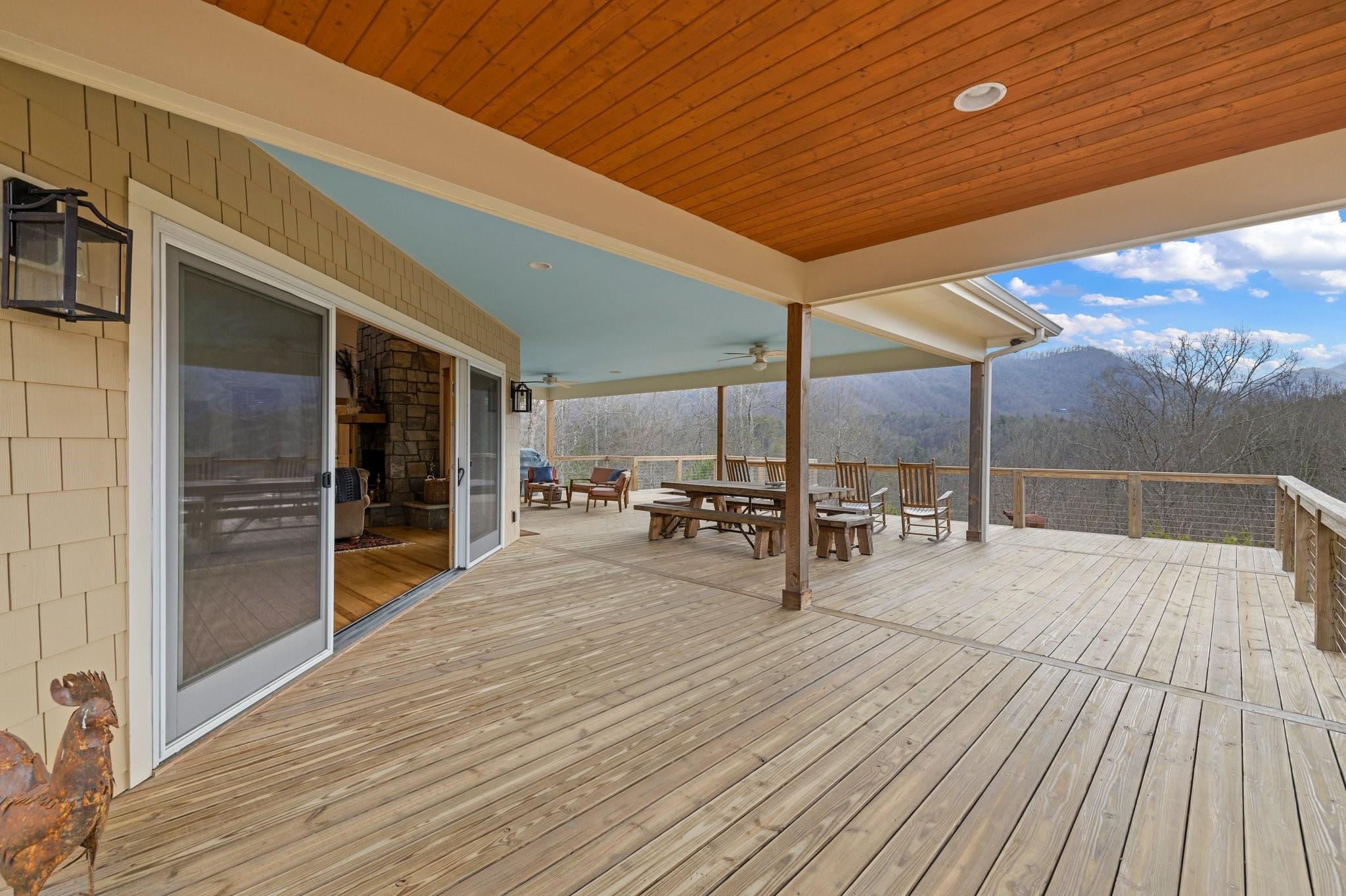 41 Rowan Hl Road Leicester, NC 28748 - Photo 4 of 48 a view of a patio with wooden floor