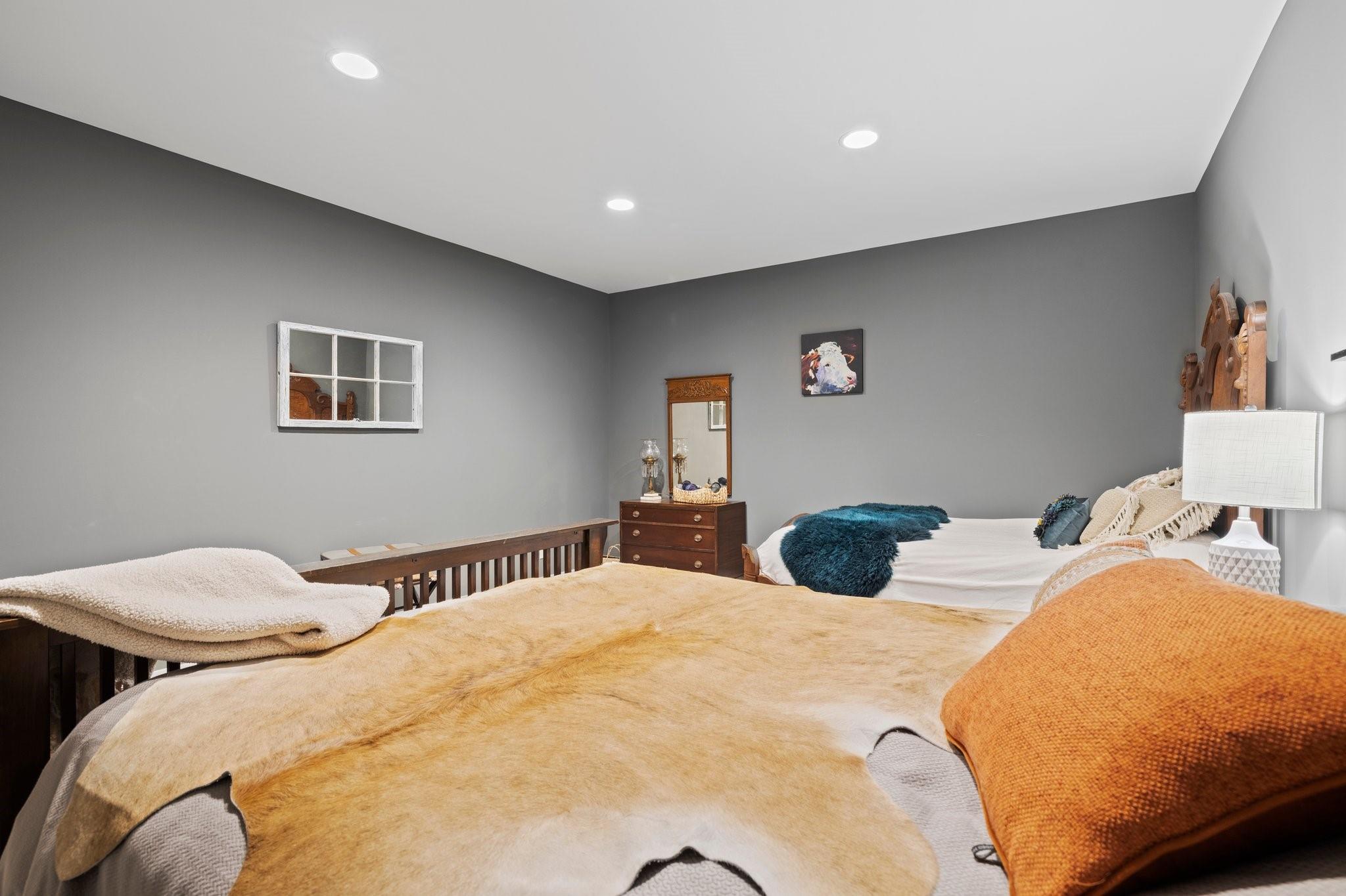 41 Rowan Hl Road Leicester, NC 28748 - Photo 43 of 48 a bedroom with two beds and a lamp