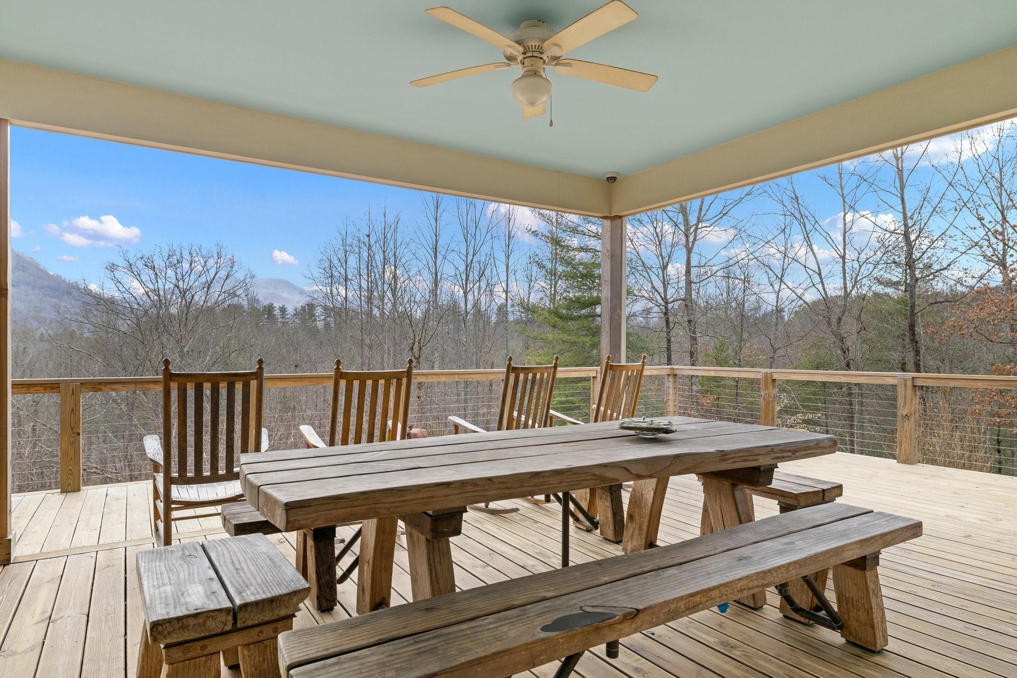 41 Rowan Hl Road Leicester, NC 28748 - Photo 7 of 48 a view of a balcony with furniture