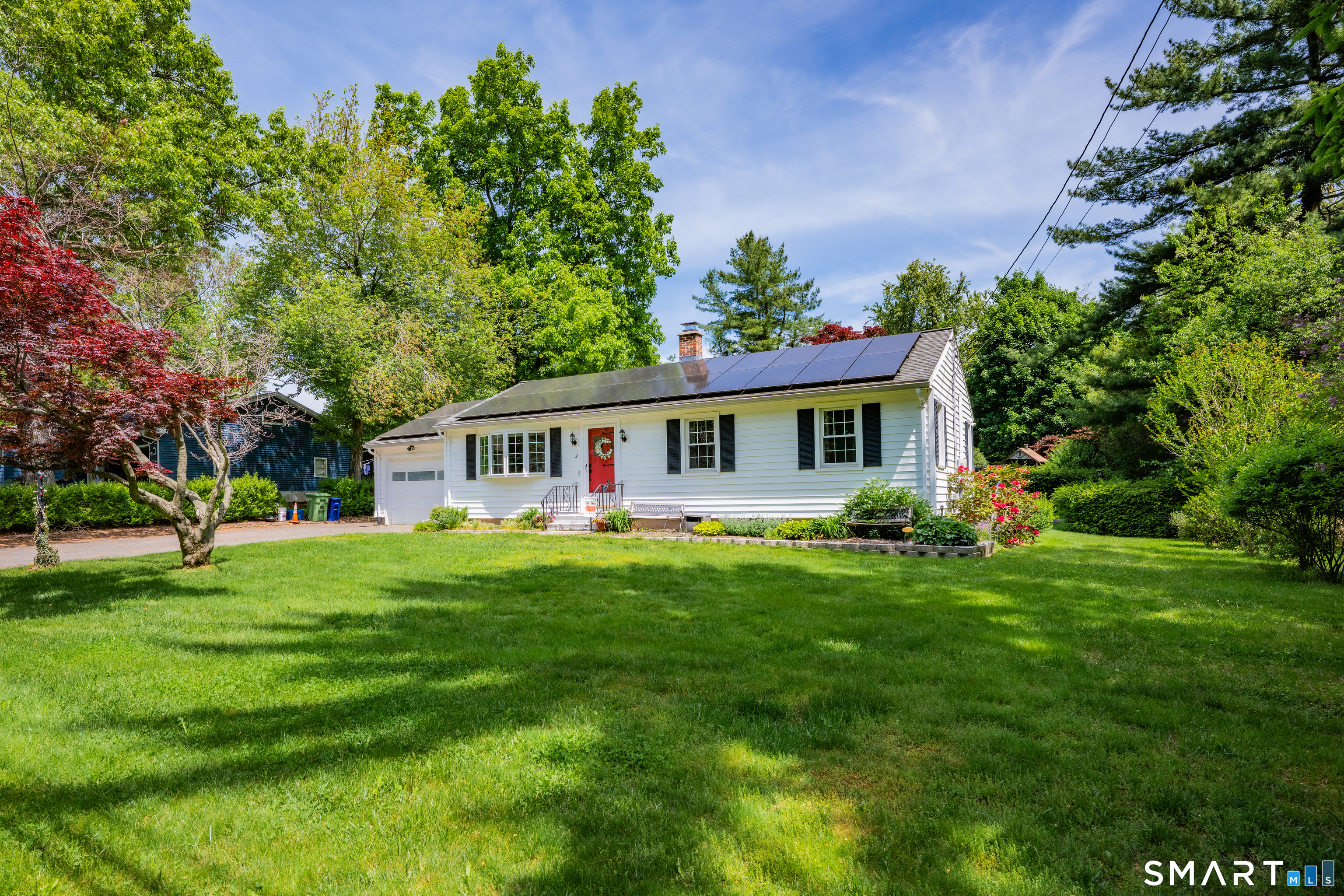2 Hemlock Road Prospect, CT 06712 - Photo 3 of 27 a front view of a house with a garden