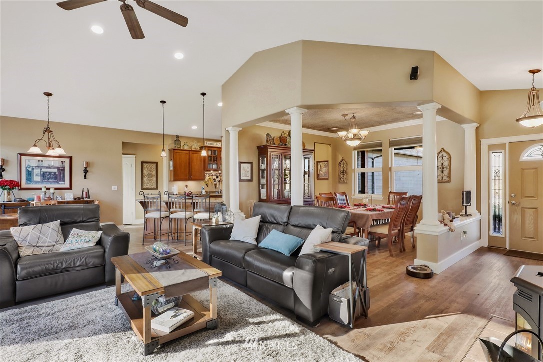 1107 Slater Road Bellingham, WA 98226 - Photo 11 of 39 a living room with furniture kitchen view and a chandelier