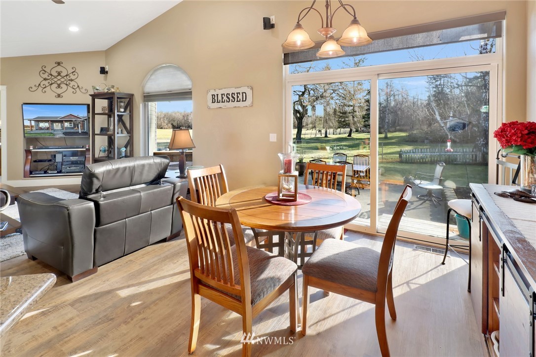 1107 Slater Road Bellingham, WA 98226 - Photo 24 of 39 a view of a dining room with furniture window and outside view