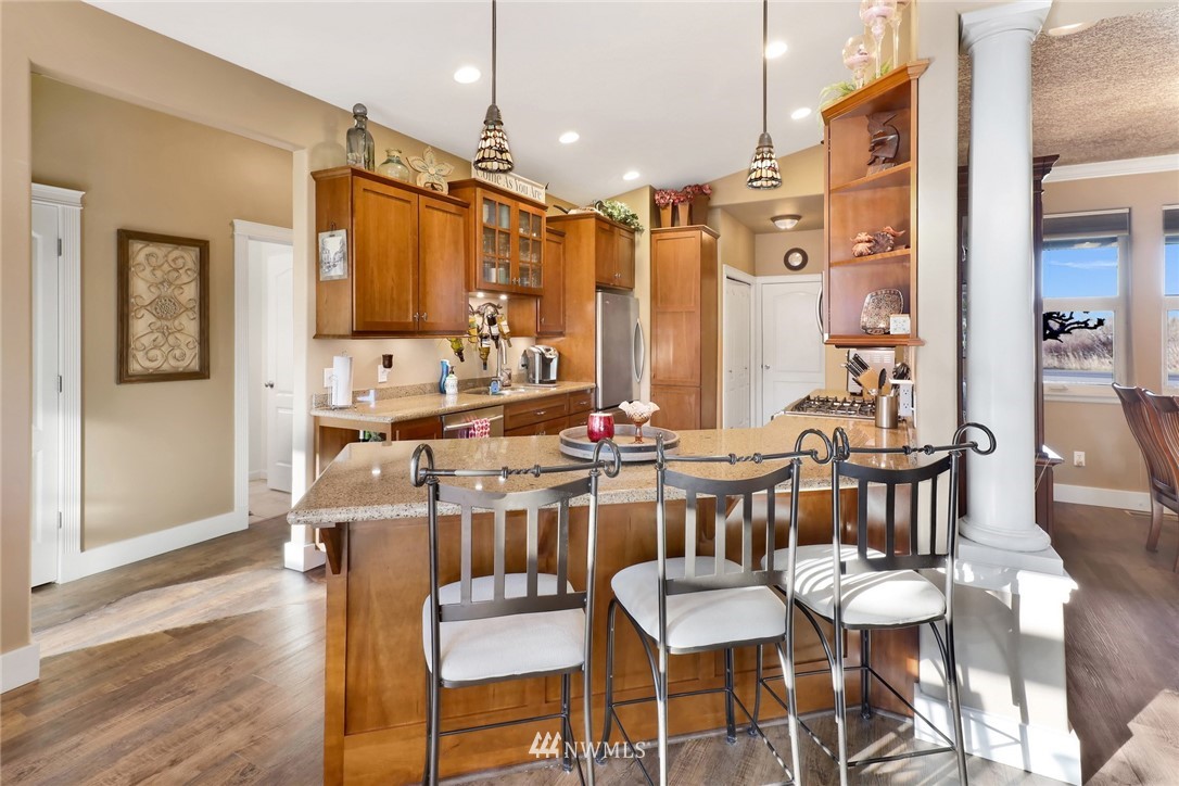 1107 Slater Road Bellingham, WA 98226 - Photo 25 of 39 a view of a dining room with furniture and wooden floor