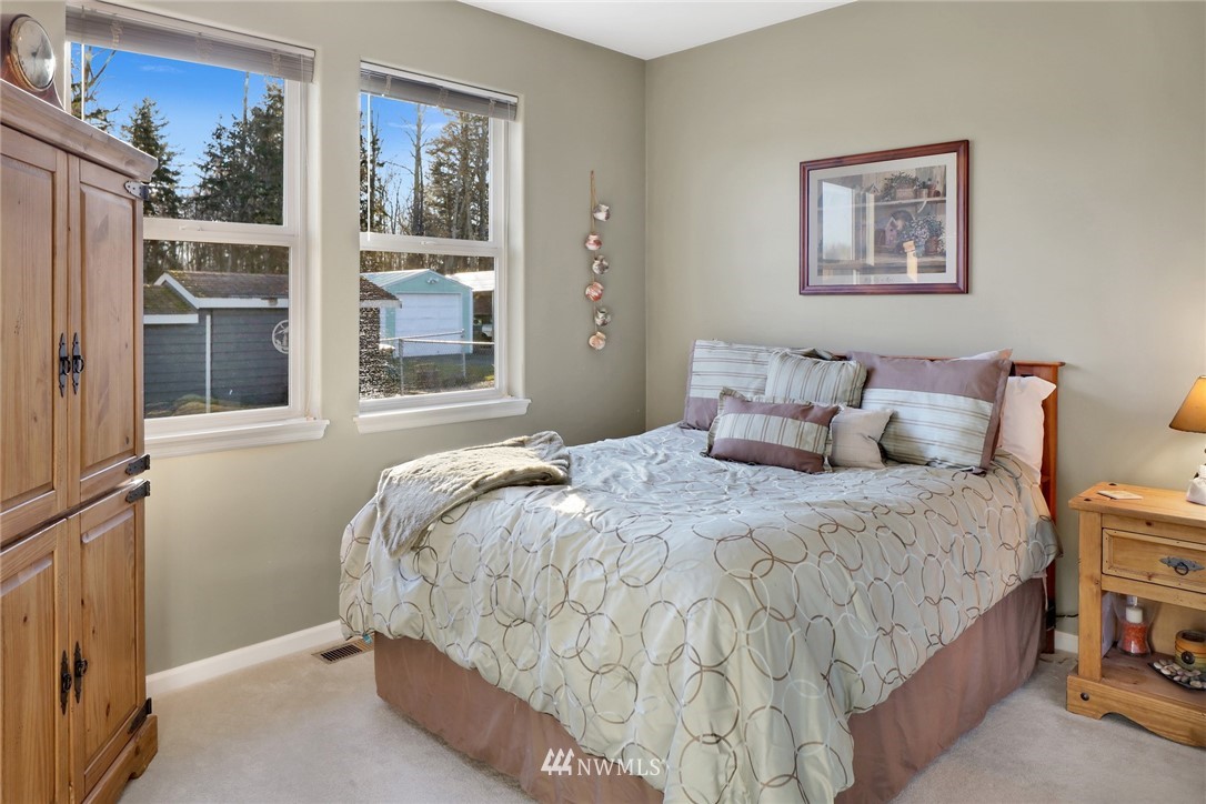 1107 Slater Road Bellingham, WA 98226 - Photo 27 of 39 a bedroom with a bed and a window
