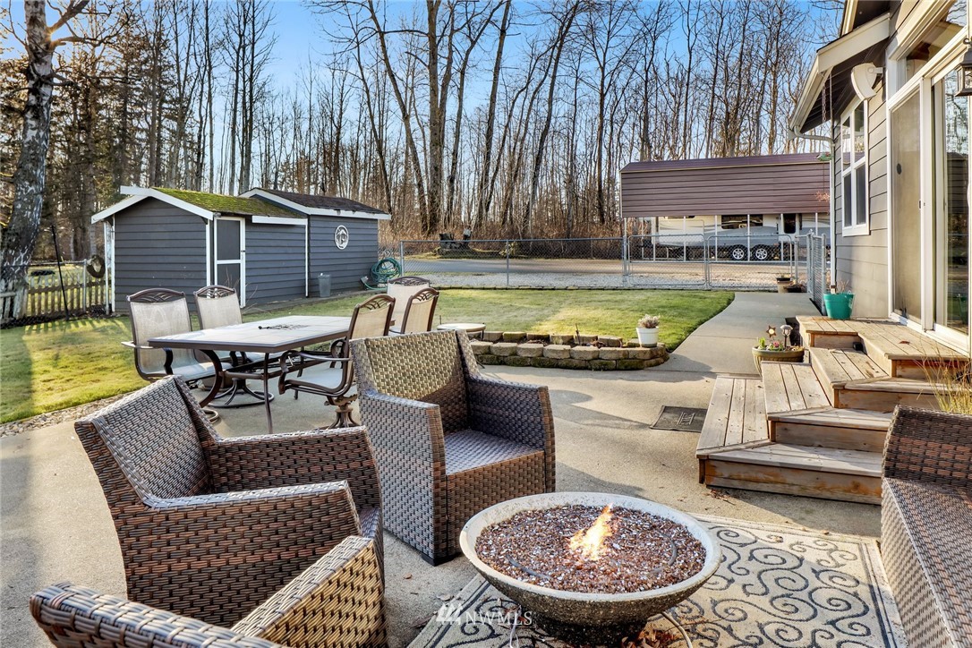 1107 Slater Road Bellingham, WA 98226 - Photo 36 of 39 a view of a chairs and table in the patio