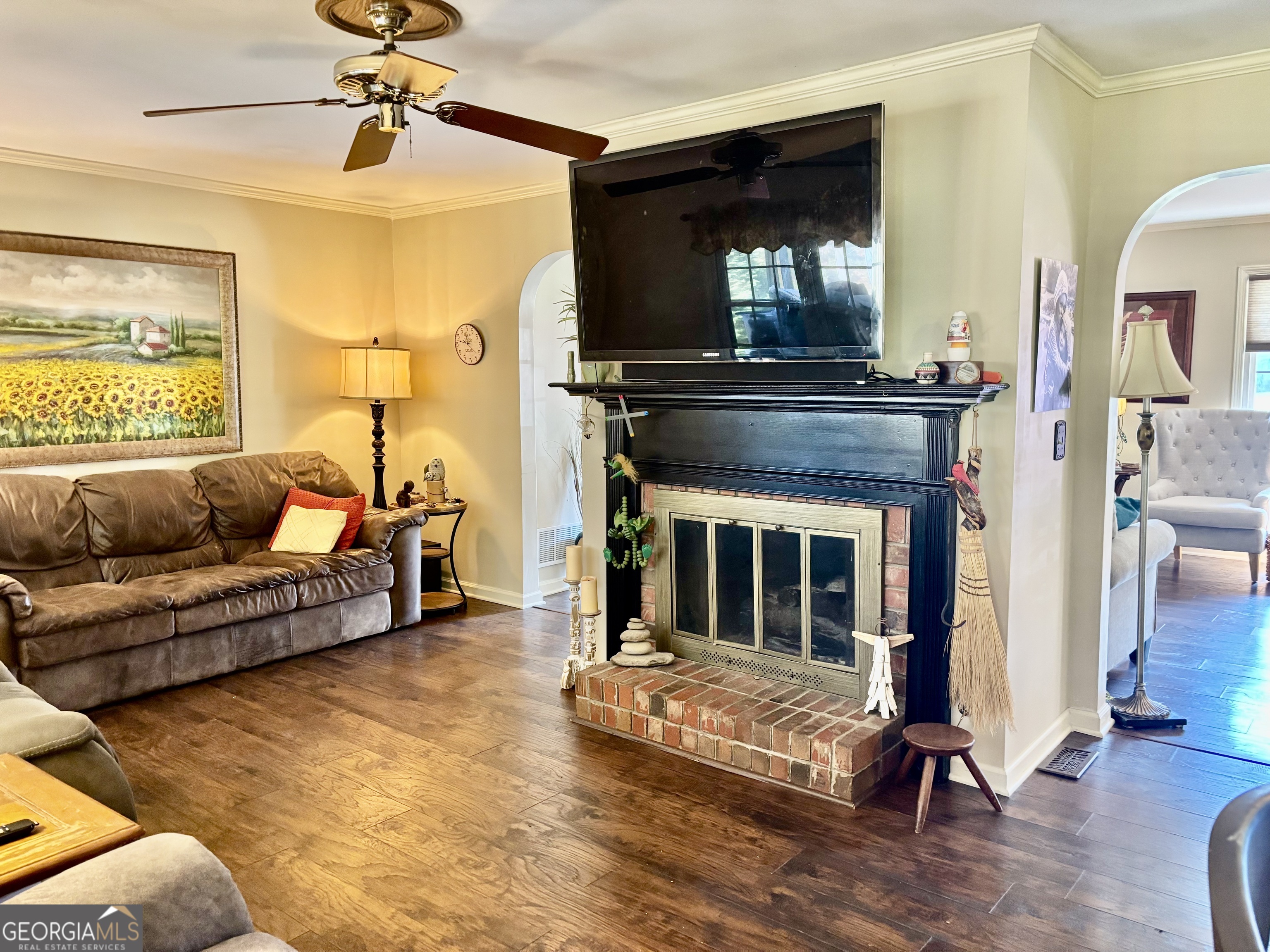 108 Deerbrook Drive Rome, GA 30165 - Photo 12 of 40 a living room with furniture and a fireplace