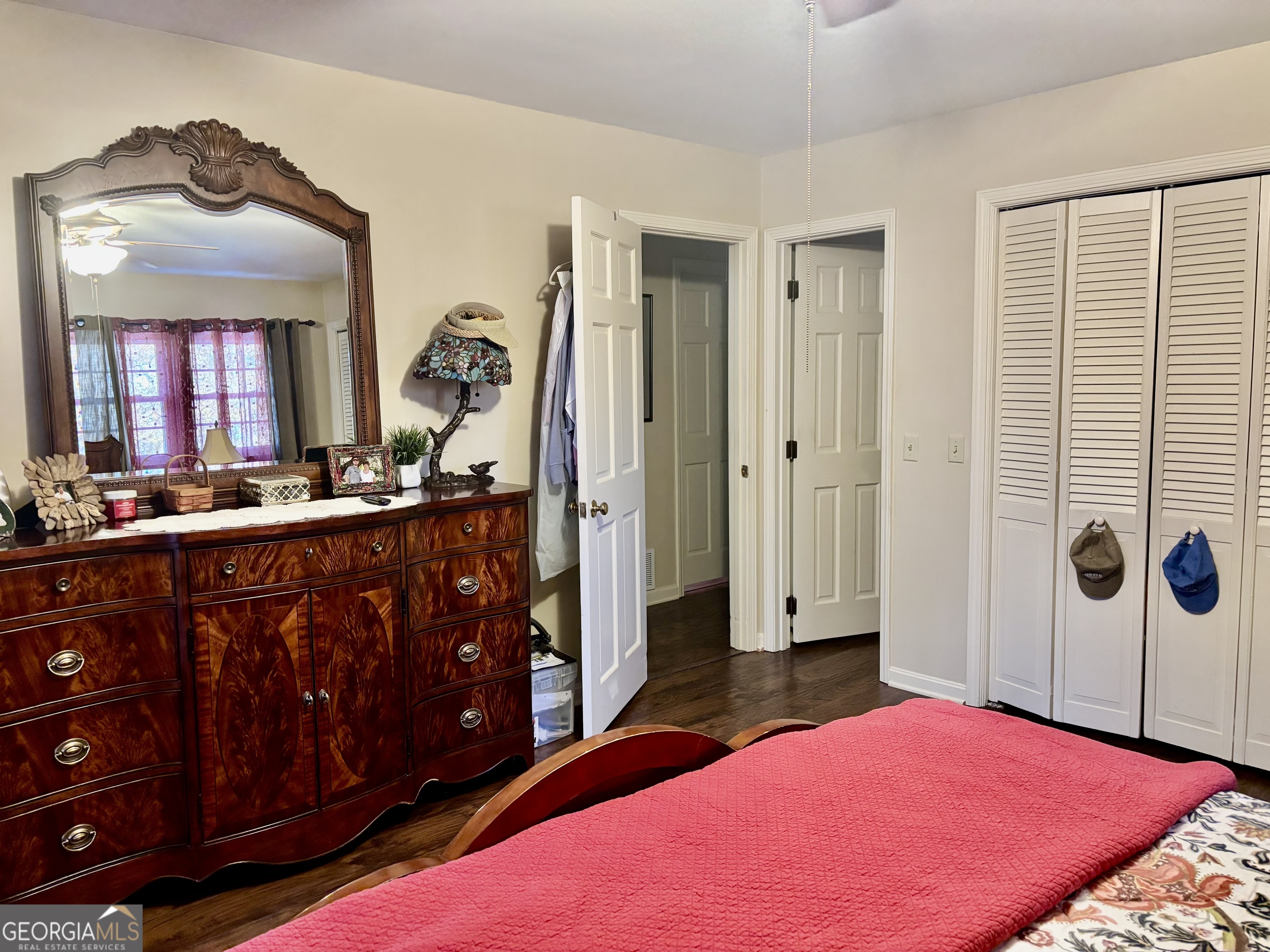 108 Deerbrook Drive Rome, GA 30165 - Photo 21 of 40 a bedroom with a dresser and a mirror