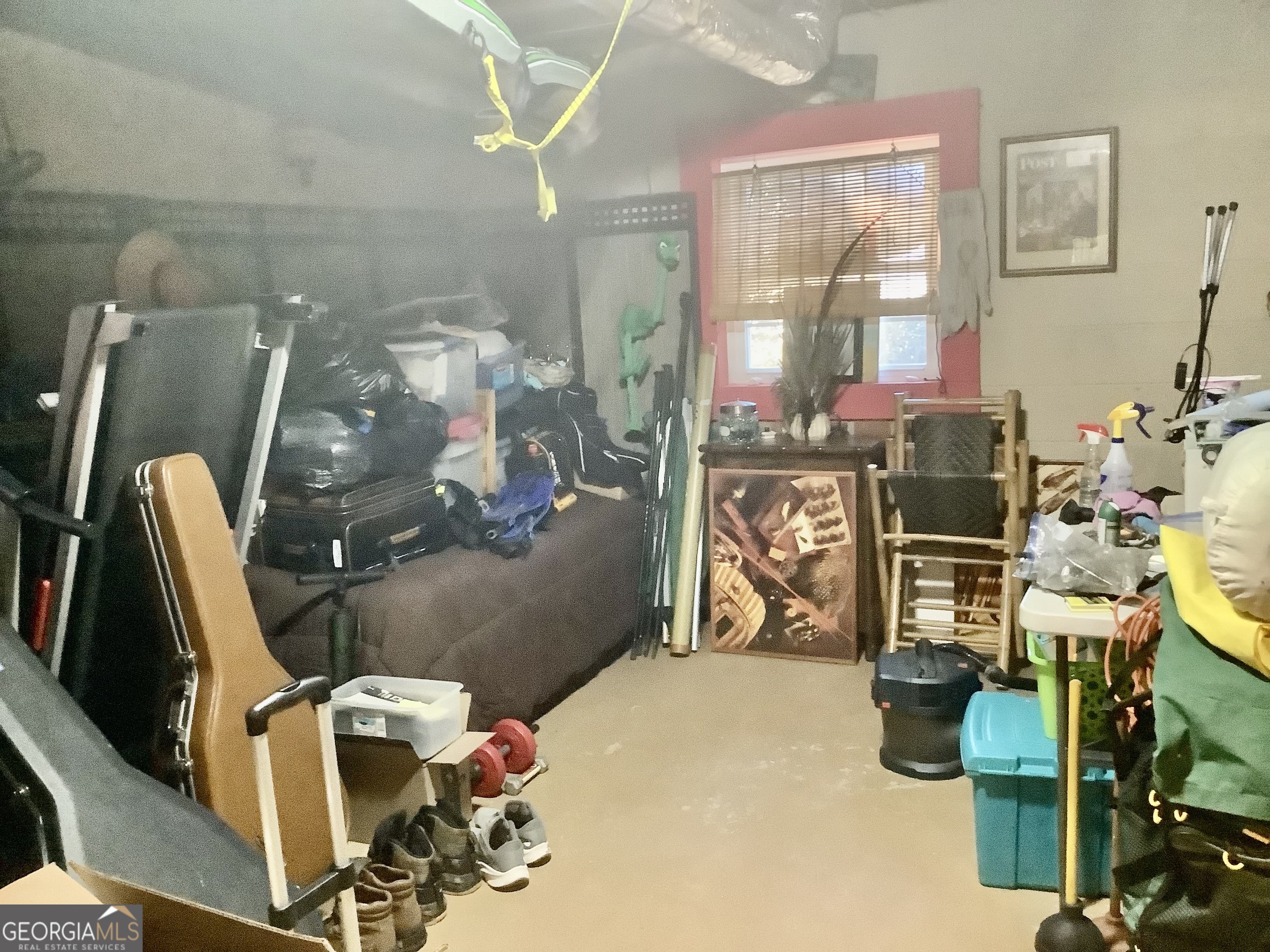 108 Deerbrook Drive Rome, GA 30165 - Photo 39 of 40 a bedroom with a bed a mirror and musical instruments