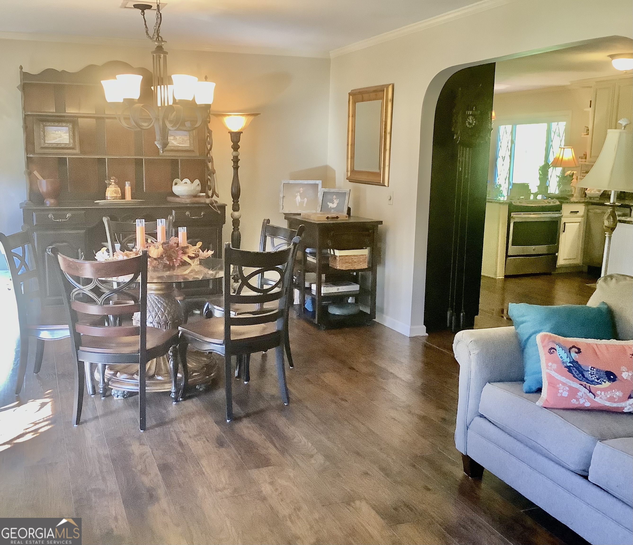 108 Deerbrook Drive Rome, GA 30165 - Photo 10 of 40 a living room with furniture and a chandelier
