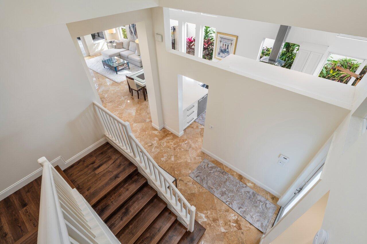 6263 Northwest 24th Street Boca Raton, FL 33434 - Photo 25 of 65 Stairs with Kitchen