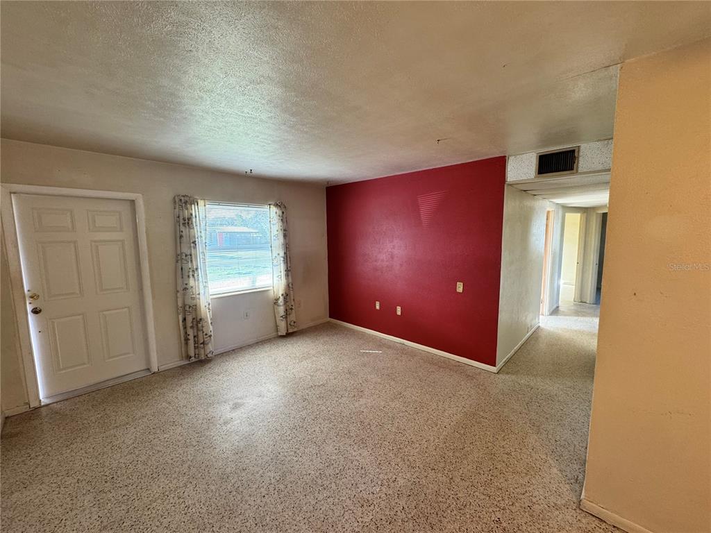 1405 Ingram Avenue Sarasota, FL 34232 - Photo 10 of 15 a view of an empty room and a window