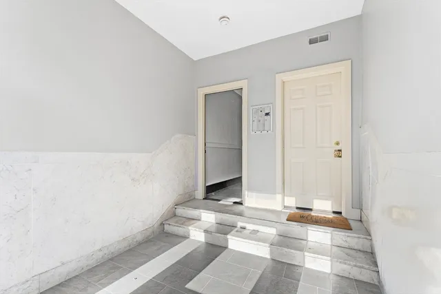 a view of a bathroom with tub