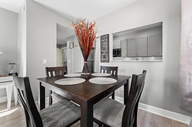 a view of a dining room with furniture