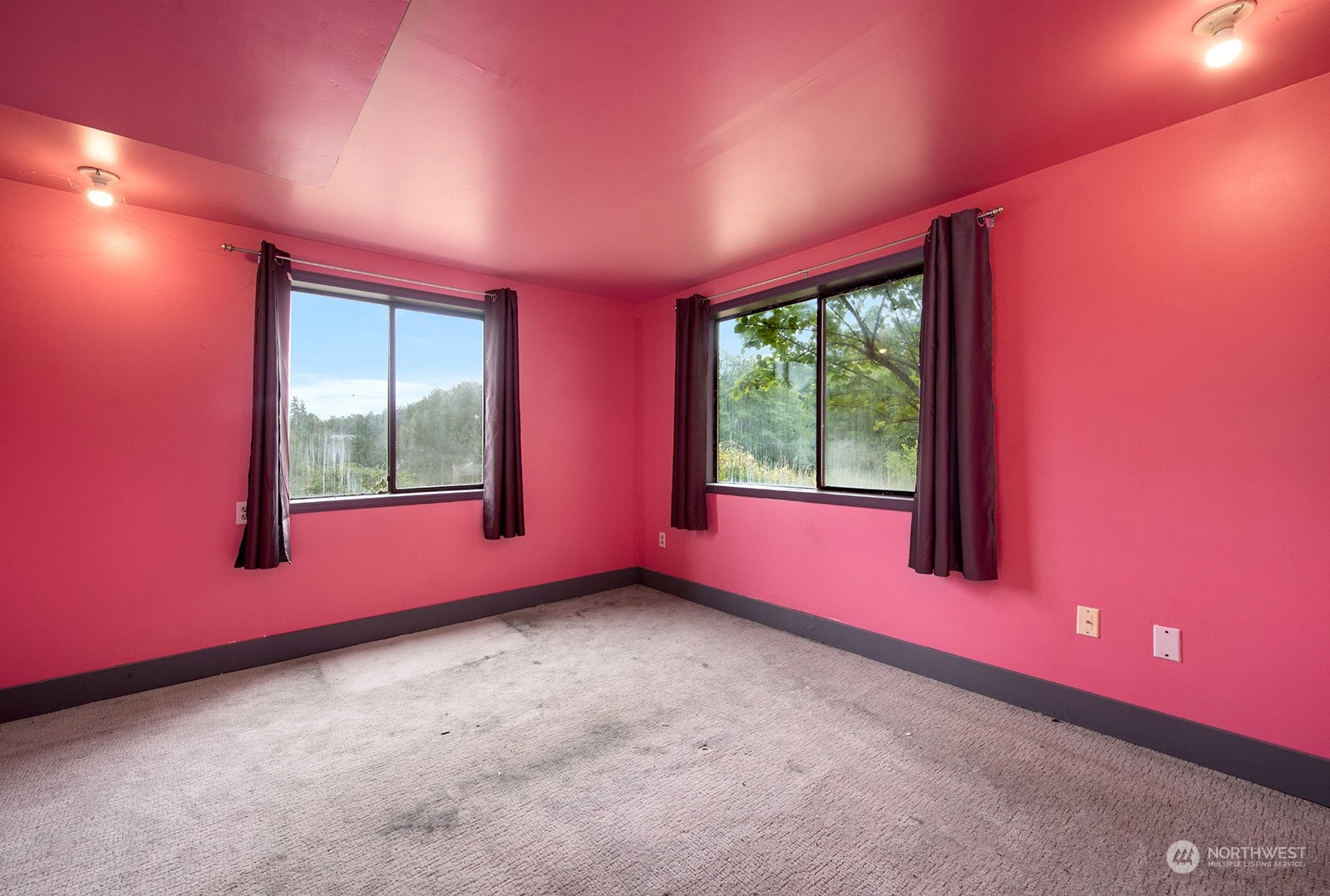 5606 Southwest 244th Street Vashon, WA 98070 - Photo 15 of 40 a empty room with windows