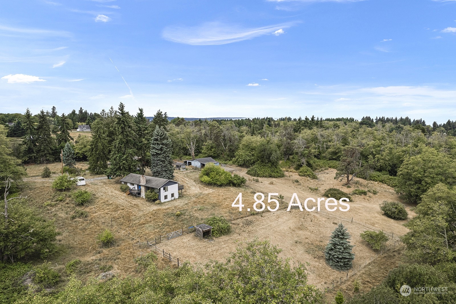5606 Southwest 244th Street Vashon, WA 98070 - Photo 2 of 40 a view of a lake with houses