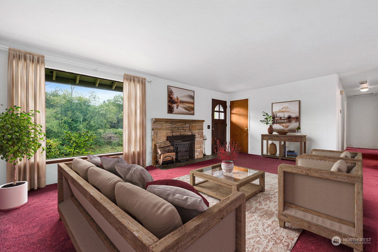 5606 Southwest 244th Street Vashon, WA 98070 - Photo 5 of 40 a living room with furniture large window and a fireplace