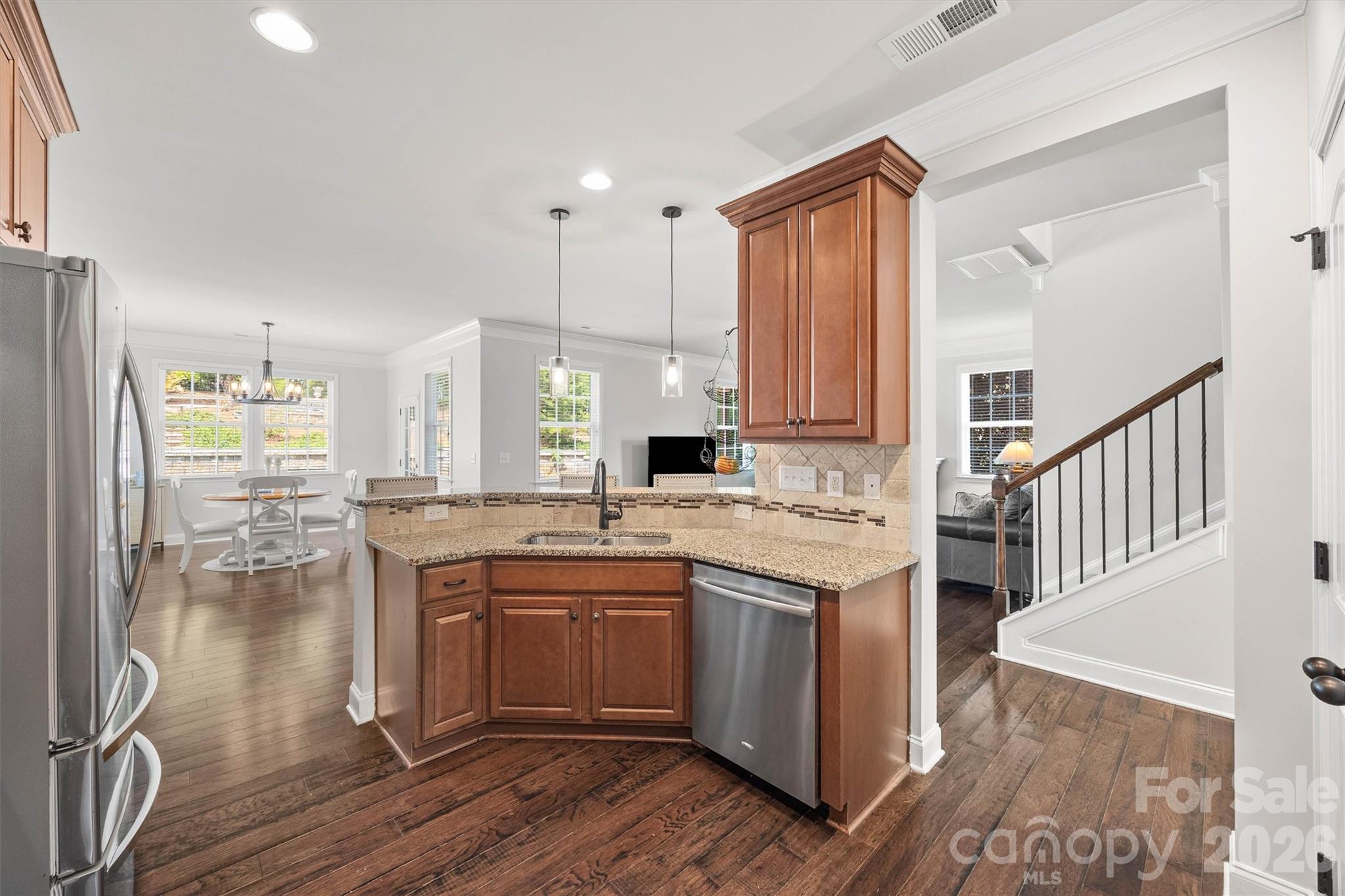 299 Annatto Way Tega Cay, SC 29708 - Photo 10 of 46 a kitchen with a sink and cabinets