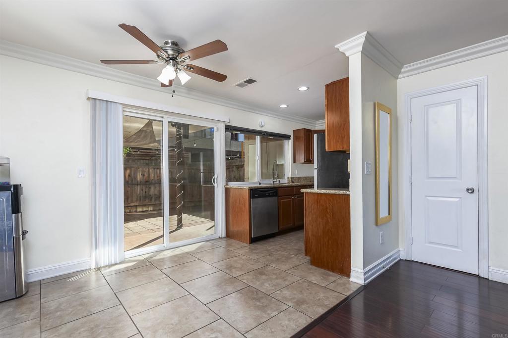 309 Sun Court El Cajon, CA 92021 - Photo 13 of 39 a open kitchen with stainless steel appliances granite countertop a refrigerator and a sink