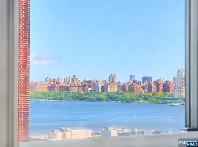 a view of a city with tall buildings