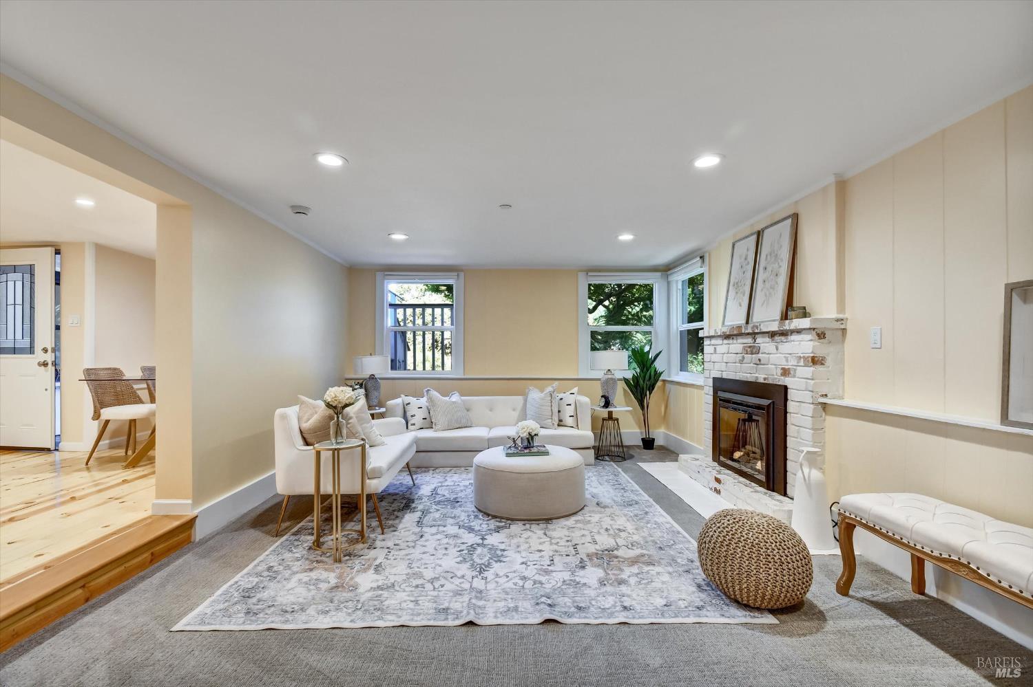148 Auburn Street San Rafael, CA 94901 - Photo 34 of 40 Bottom Unit Family Room Cozy up to the Gas Fireplace.