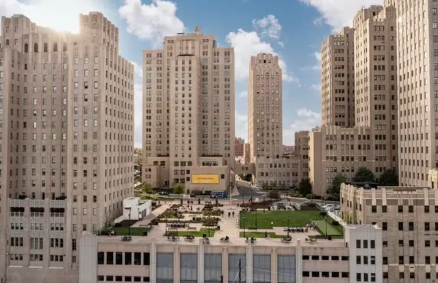 a view of city with tall buildings