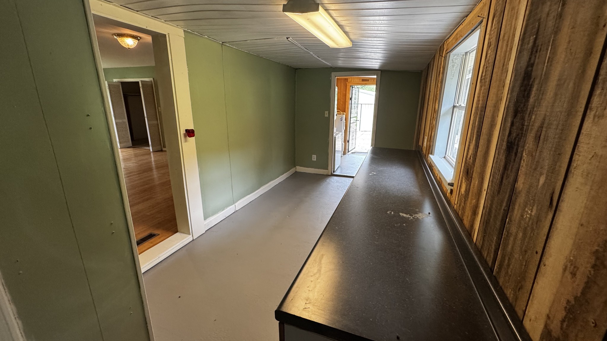 315 Loyd Road Pulaski, TN 38478 - Photo 11 of 73 a view of a hallway with wooden floor and staircase