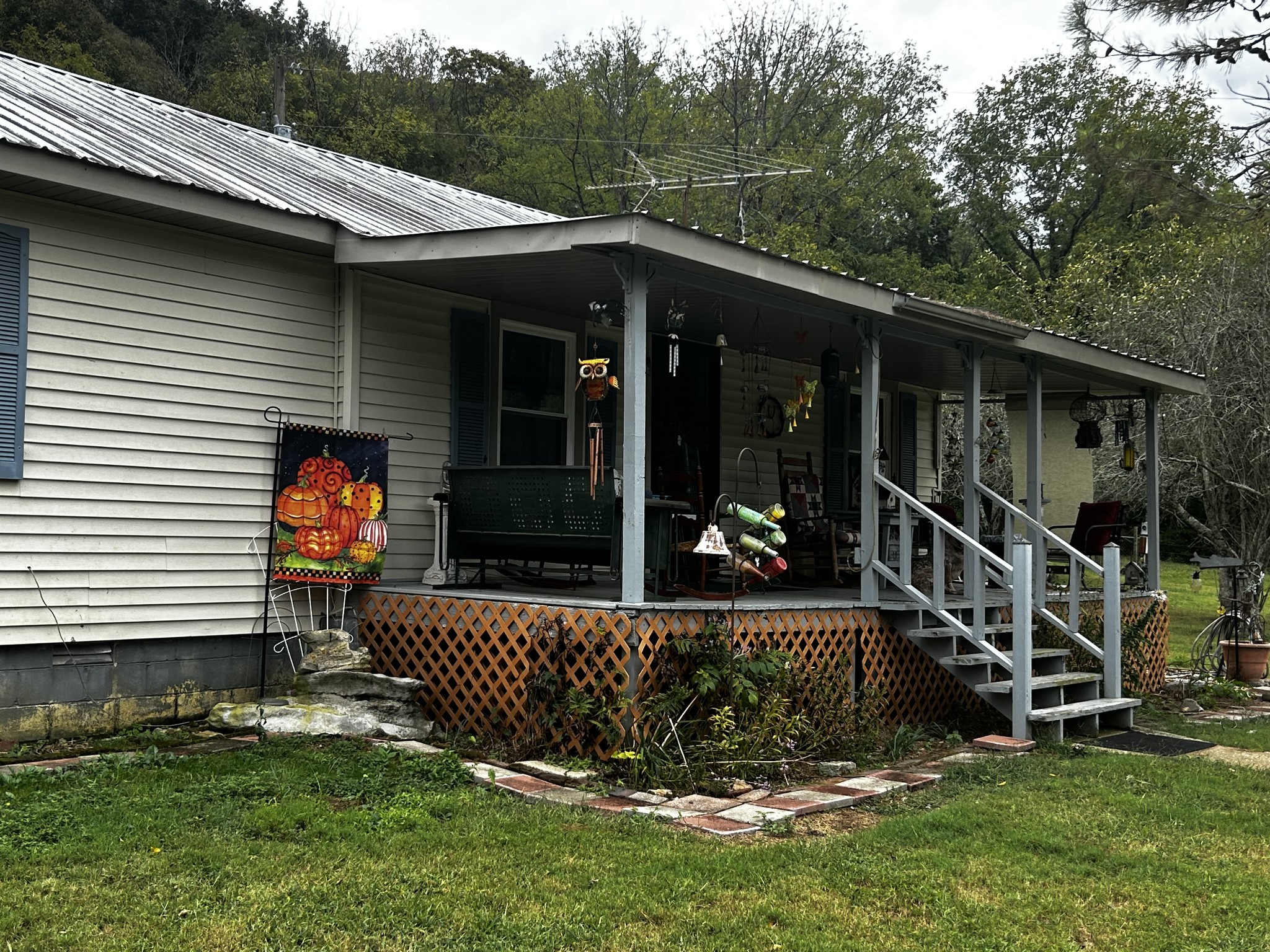 315 Loyd Road Pulaski, TN 38478 - Photo 29 of 73 a view of a chair and table in backyard of the house
