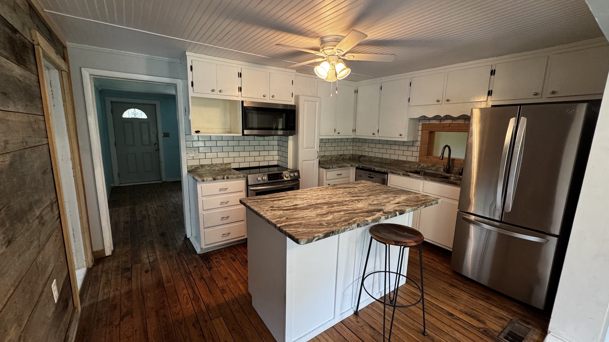 315 Loyd Road Pulaski, TN 38478 - Photo 8 of 73 a kitchen with stainless steel appliances granite countertop a refrigerator oven a stove top oven a sink and dishwasher