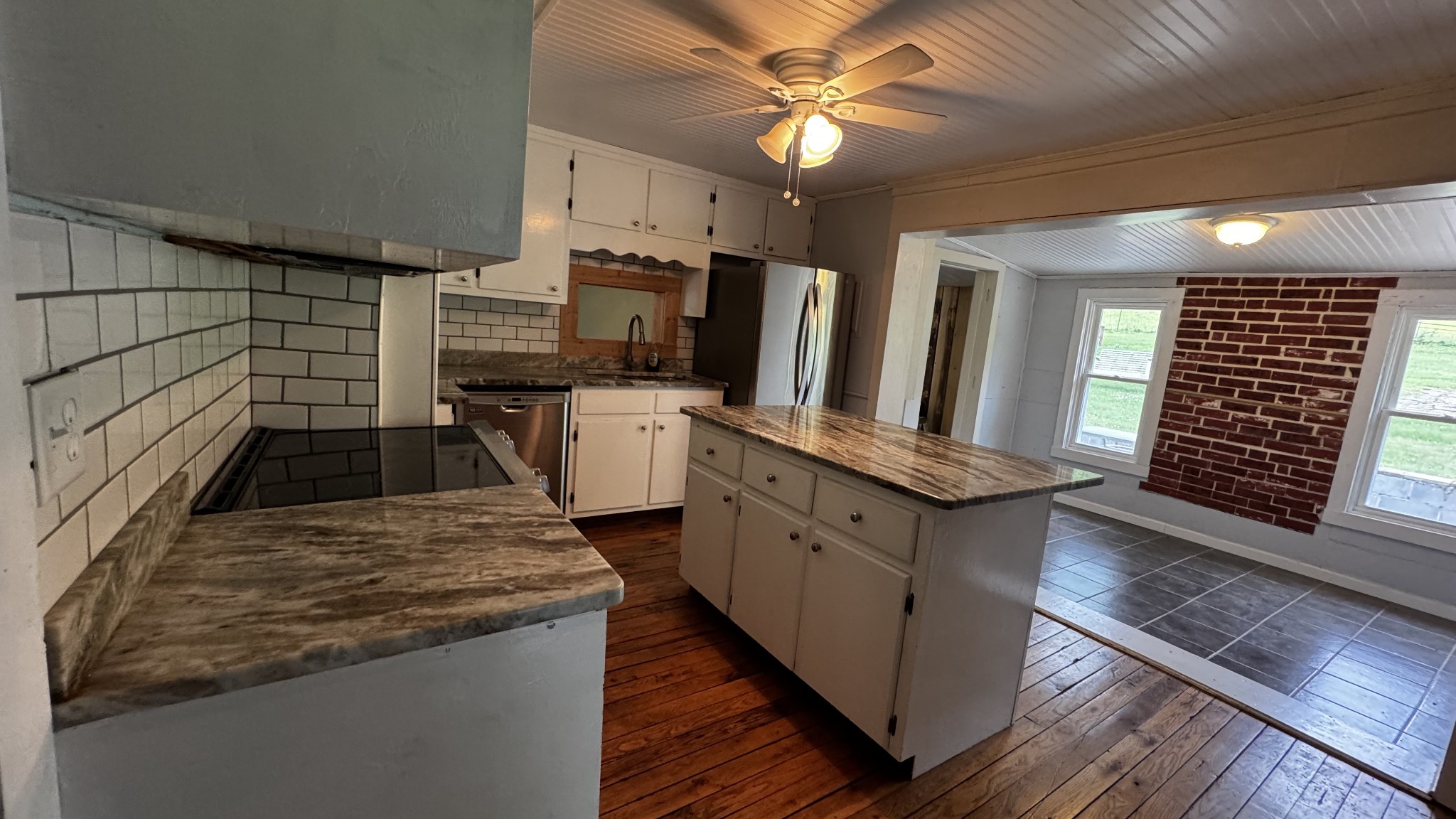 315 Loyd Road Pulaski, TN 38478 - Photo 9 of 73 a kitchen with sink cabinets and stainless steel appliances