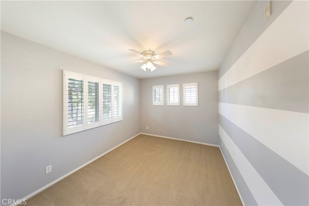 90 Hedge Bloom Irvine, CA 92618 - Photo 19 of 22 a view of an empty room with a window