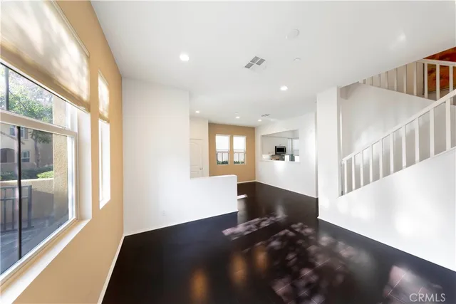a view of a living room and dining room