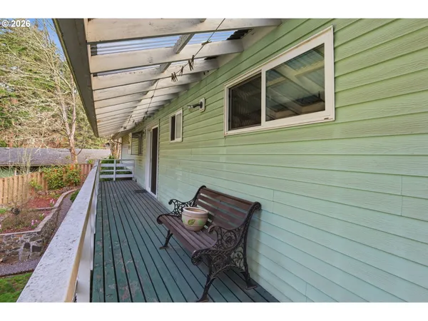a view of deck with wooden floor and seating space