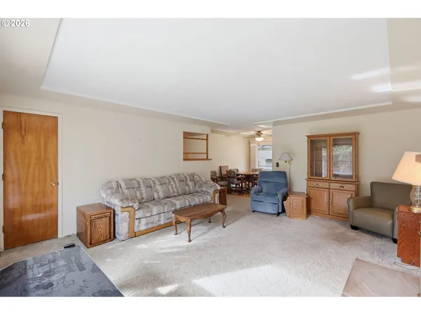 a living room with furniture and a couch