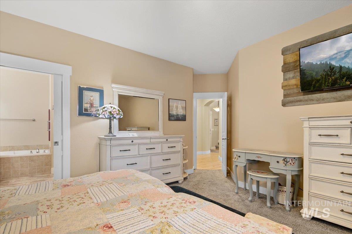 2264 East Comisky Street Meridian, ID 83646 - Photo 20 of 47 Bedroom with carpet and arched walkways