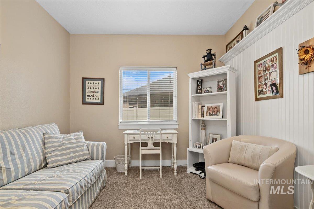 2264 East Comisky Street Meridian, ID 83646 - Photo 22 of 47 Living area featuring carpet and baseboards