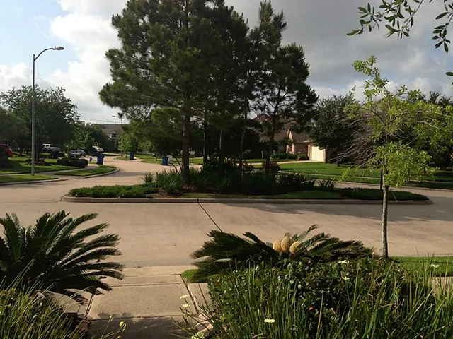 a living room with furniture and a piano