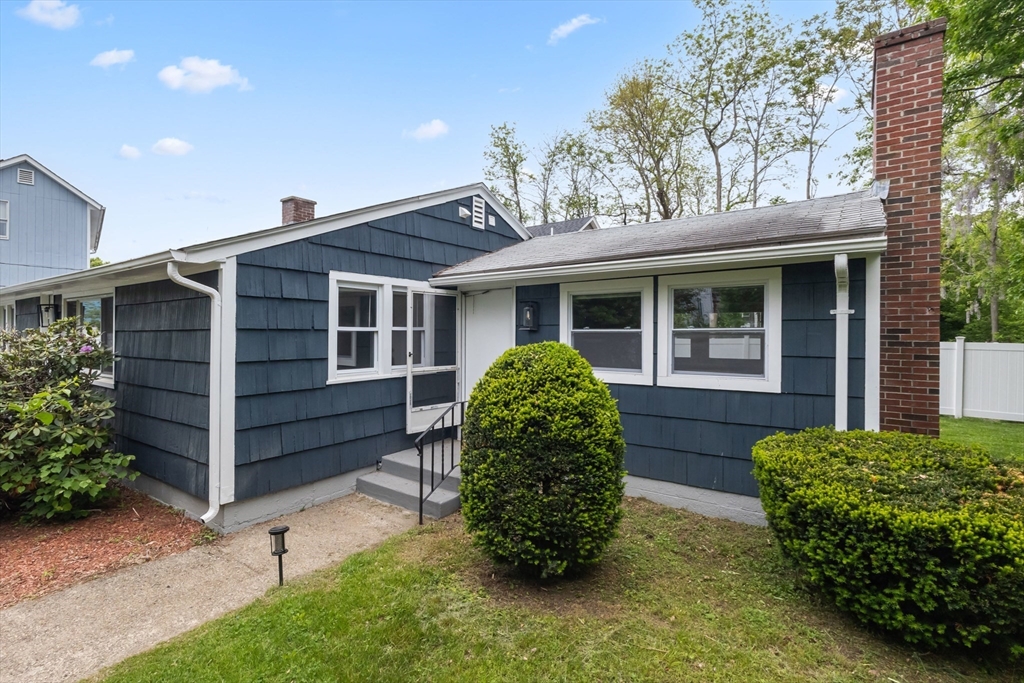 5 Phoenix Street Worcester, MA 01604 - Photo 2 of 32 a front view of a house with garden