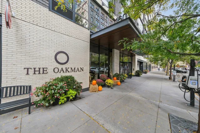 a view of a chairs and table in the back yard of the house