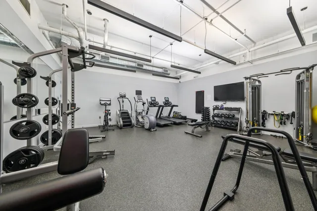 a view of a building with sitting area