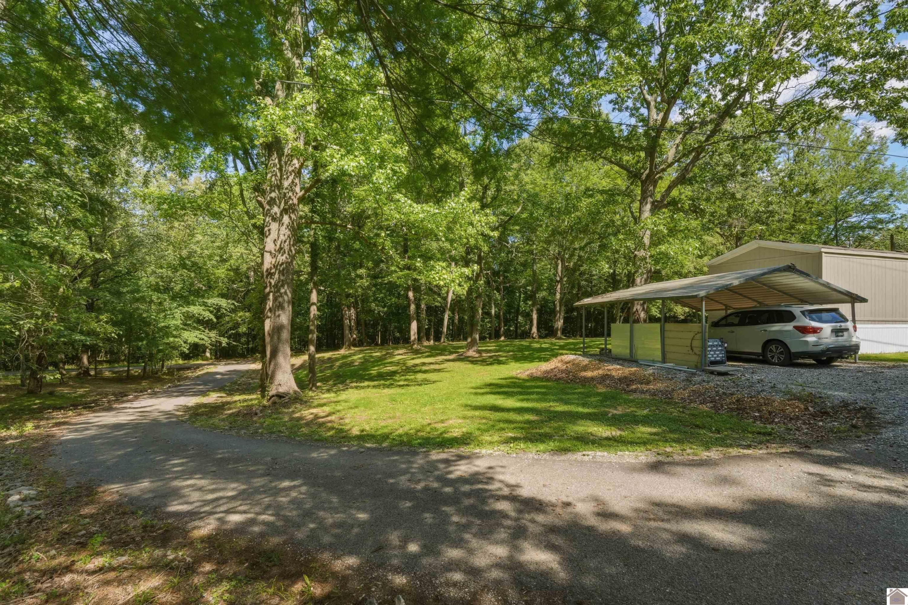 436 Rudy Brooks Lane Benton, KY 42025 - Photo 31 of 37 Gravel Portion of Driveway/ Carport