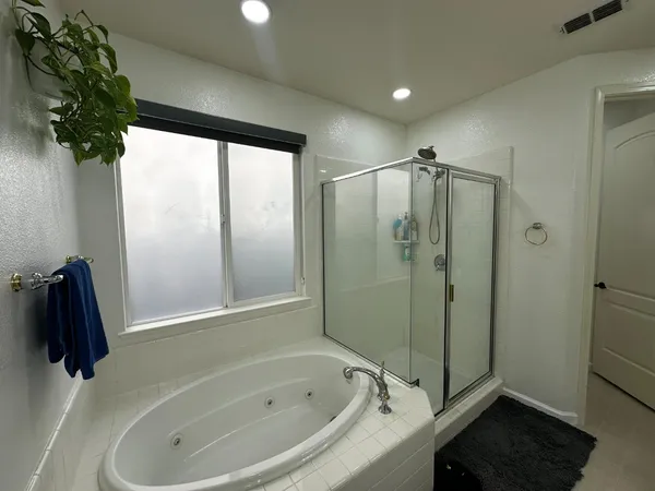 a view of workspace with lounge chair