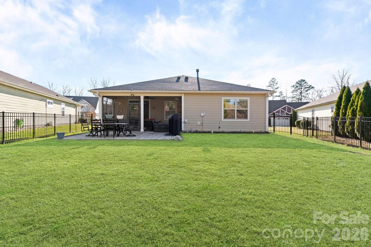 4979 Looking Glass Trail Denver, NC 28037 - Photo 2 of 46 a front view of house with yard and outdoor seating