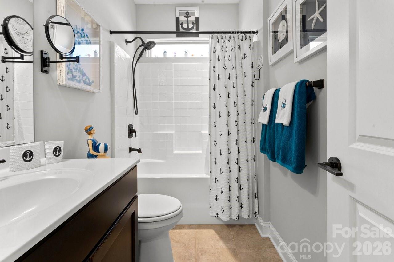 4979 Looking Glass Trail Denver, NC 28037 - Photo 31 of 46 a bathroom with a sink toilet and shower