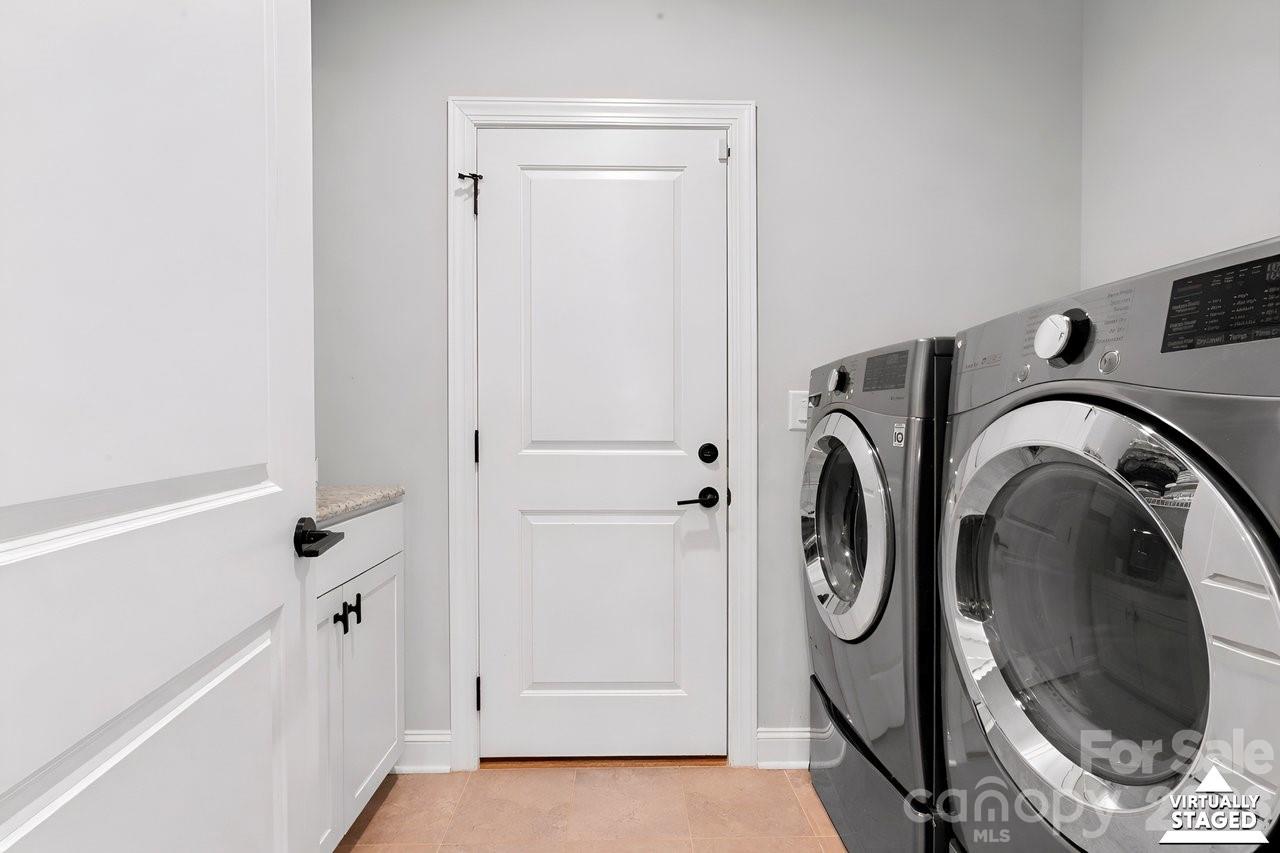 4979 Looking Glass Trail Denver, NC 28037 - Photo 32 of 46 a view of bathroom with washer and dryer