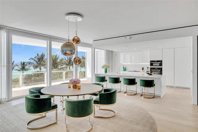 a living room with furniture a rug and white walls